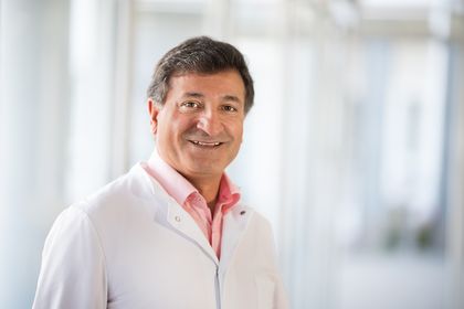 Herr Dr. Merdan Celik